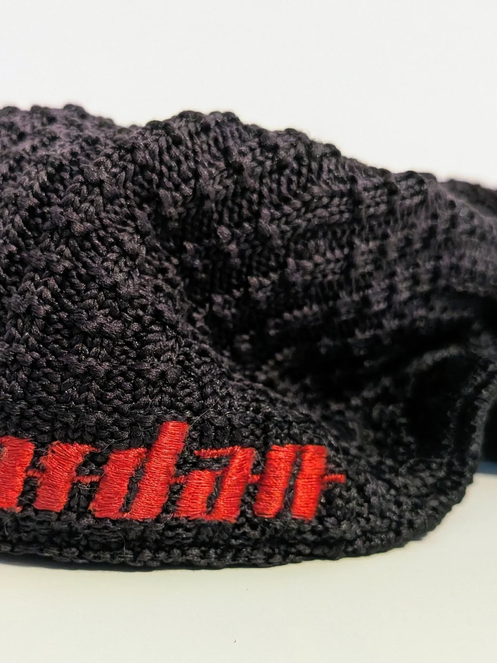 Nike Black Knit Visor Cap with Red Logo